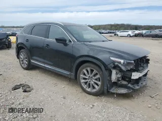 2021 Mazda CX-9 Carbon Edition z VIN JM3TCADY9M0514372, wystawiony jako Copart lot #52902555 z przebiegiem 99 812 mil mil oraz Szkoda całkowita • Salvage title. Historia ofert i sprzedaży dostępna na DreamBid. Obrazek 4.