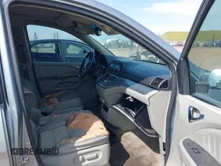 2009 Honda Odyssey EX-L with VIN 5FNRL387X9B055362, listed as a IAAI auction lot 42051881 with 139,172 mi miles and . Bid and sale history available at DreamBid. Image 5.