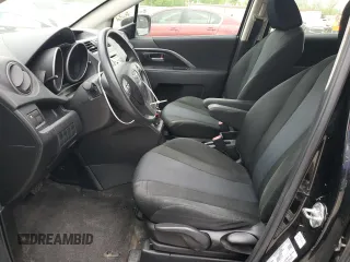 2015 Mazda 5 Sport with VIN JM1CW2BLXF0184094, listed as a Copart auction lot 56618405 with 98,757 mi miles and Salvage title. Bid and sale history available at DreamBid. Image 7.