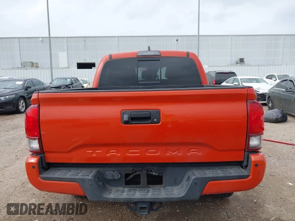 2018 Toyota Tacoma SR5 z VIN 3TMAZ5CN2JM076140, wystawiony jako IAAI lot #41913486 z przebiegiem 142 212 mil mil oraz . Historia ofert i sprzedaży dostępna na DreamBid. Obrazek 17.