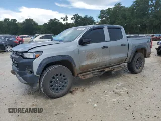 2023 Chevrolet Colorado 4WD Trail Boss with VIN 1GCPTEEK1P1257671, listed as a Copart auction lot 64379055 with 24,172 mi miles and Salvage title. Bid and sale history available at DreamBid. Image 1.