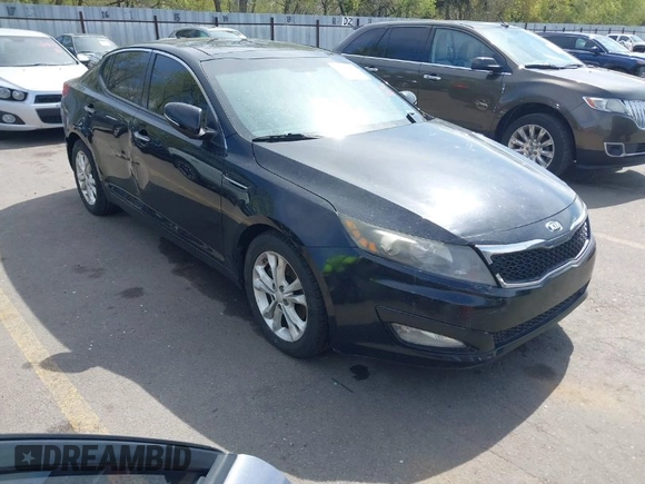 2013 Kia Optima EX with VIN 5XXGN4A79DG174558, listed as a IAAI auction lot 42078646 with 163,161 mi miles. Bid and sale history available at carsss.com. Image 1.