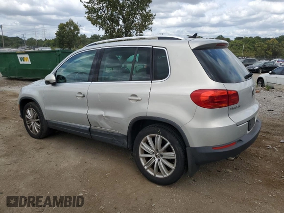 2013 Volkswagen Tiguan SE z VIN WVGBV7AX0DW539618, wystawiony jako Copart lot #71529804 z przebiegiem 148 362 mil mil oraz Szkoda całkowita • Salvage title. Historia ofert i sprzedaży dostępna na DreamBid. Obrazek 2.