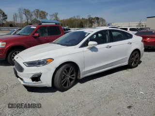 2020 Ford Fusion Titanium with VIN 3FA6P0K9XLR204414, listed as a Copart auction lot 51133515 with 123,564 mi miles and Clean title. Bid and sale history available at DreamBid. Image 1.