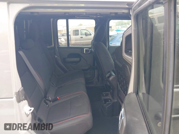 2021 Jeep Gladiator Rubicon with VIN 1C6JJTBG8ML619972, listed as a IAAI auction lot 42057805 with 37,875 mi miles and . Bid and sale history available at DreamBid. Image 8.