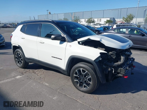 2020 Jeep Compass Trailhawk with VIN 3C4NJDDB4LT144129, listed as a IAAI auction lot 42582688 with 67,112 mi miles and . Bid and sale history available at DreamBid. Image 1.