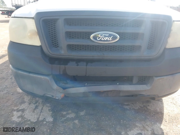 2005 Ford F-150 XL with VIN 1FTRF12W95NB42063, listed as a IAAI auction lot 41874938 with 254,029 mi miles. Bid and sale history available at carsss.com. Image 6.