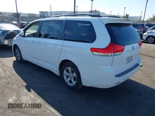 2012 Toyota Sienna LE AAS with VIN 5TDKK3DCXCS276325, listed as a IAAI auction lot 41791385 with 133,635 mi miles. Bid and sale history available at carsss.com. Image 3.