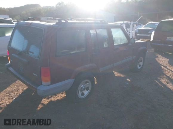 2001 Jeep Cherokee Sport with VIN 1J4FT48S11L539624, listed as a IAAI auction lot 41370117 with 120,052 mi miles. Bid and sale history available at carsss.com. Image 4.