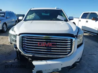 2017 GMC Yukon XL SLT z VIN 1GKS2GKC0HR207440, wystawiony jako IAAI lot #41715100 z przebiegiem 139 529 mil mil oraz . Historia ofert i sprzedaży dostępna na DreamBid. Obrazek 13.