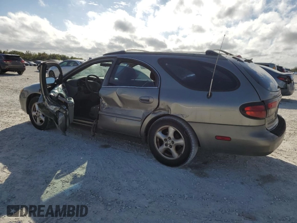 2003 Ford Taurus SE Standard with VIN 1FAFP58U33A259080, listed as a Copart auction lot 86819024 with 143,482 mi miles and Salvage Title. Bid and sale history available at carsss.com. Image 2.