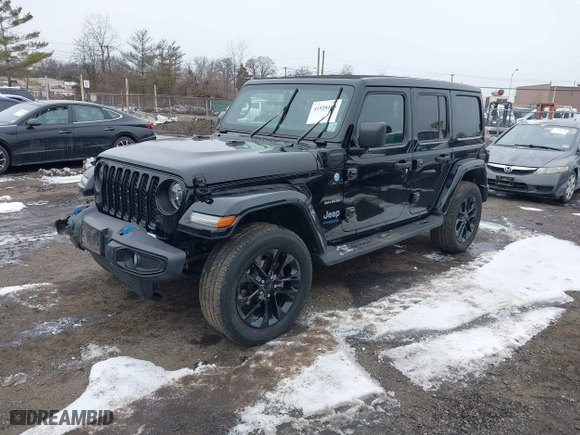 2022 Jeep Wrangler 4xe Unlimited Sahara with VIN 1C4JJXP66NW101035, listed as a IAAI auction lot 41528135 with 17,943 mi miles. Bid and sale history available at carsss.com. Image 17.