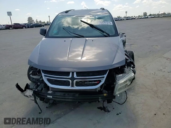 2013 Dodge Journey SE с VIN 3C4PDCAB9DT656887, выставлен на аукционе Copart как лот 54791315 с пробегом 130 394 миль миль и Списание • Salvage title. История ставок и продаж доступна на DreamBid. Изображение 14.