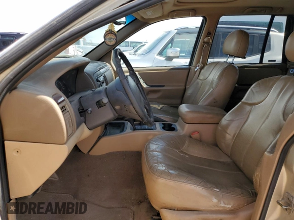 2000 Jeep Grand Cherokee Laredo with VIN 1J4GW48S6YC304447, listed as a Copart auction lot 58001035 with Not provided miles and Clean title. Bid and sale history available at DreamBid. Image 7.