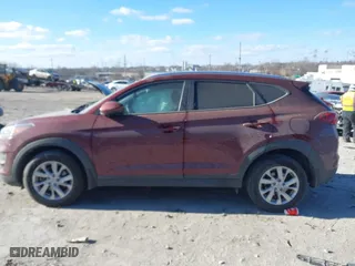 2020 Hyundai Tucson Value with VIN KM8J3CA42LU149811, listed as a IAAI auction lot 41642255 with 60,936 mi miles. Bid and sale history available at carsss.com. Image 13.