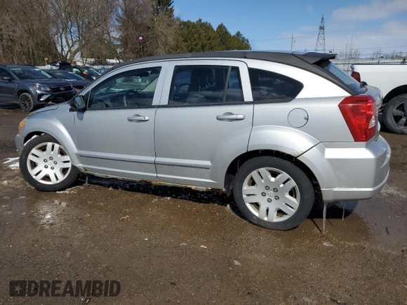 2010 Dodge Caliber SXT z VIN 1B3CB4HA4AD597158, wystawiony jako Copart lot #51757335 z przebiegiem 128 791 mil mil oraz Czysty tytuł • Clean title. Historia ofert i sprzedaży dostępna na DreamBid. Obrazek 2.