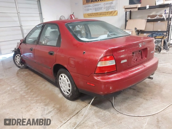 1994 Honda Accord DX with VIN 1HGCD562XRA176098, listed as a IAAI auction lot 41228156 with 113,553 mi miles and . Bid and sale history available at DreamBid. Image 3.