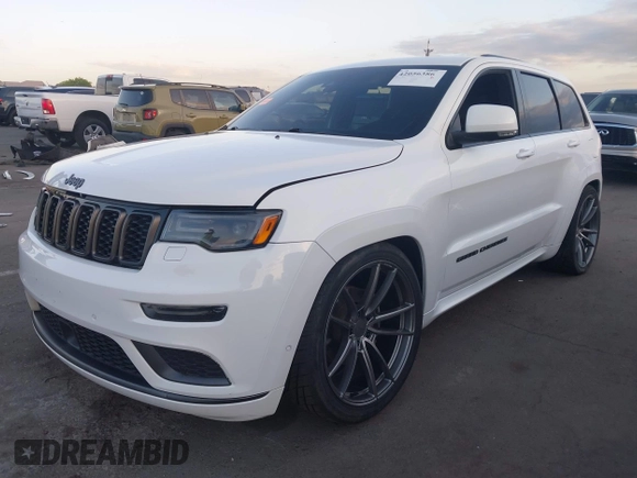 2018 Jeep Grand Cherokee Overland z VIN 1C4RJFCG7JC158464, wystawiony jako IAAI lot #42056386 z przebiegiem 94 608 mil mil oraz . Historia ofert i sprzedaży dostępna na DreamBid. Obrazek 19.