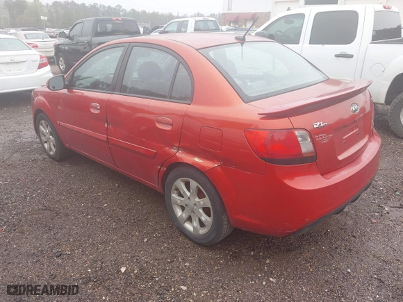 2011 Kia Rio LX with VIN KNADH4A33B6714471, listed as a IAAI auction lot 41970737 with 188,214 mi miles. Bid and sale history available at carsss.com. Image 3.