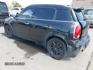 2016 MINI Countryman S with VIN WMWZC3C50GWT08510, listed as a IAAI auction lot 42046902 with 103,178 mi miles and . Bid and sale history available at DreamBid. Image 3.
