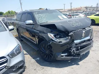 2021 Lincoln Navigator Black Label z VIN 5LMJJ3TTXMEL02695, wystawiony jako IAAI lot #42023488 z przebiegiem Nie podano mil oraz . Historia ofert i sprzedaży dostępna na DreamBid. Obrazek 1.