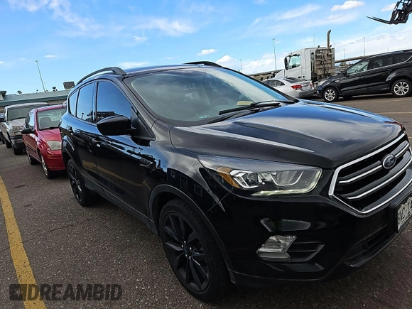 2018 Ford Escape SE z VIN 1FMCU9GDXJUA69802, wystawiony jako IAAI lot #42413413 z przebiegiem 92 564 mil mil oraz . Historia ofert i sprzedaży dostępna na DreamBid. Obrazek 9.