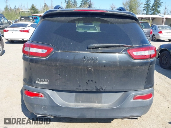 2015 Jeep Cherokee North with VIN 1C4PJMCS3FW777973, listed as a IAAI auction lot 42043203 with 158,536 mi miles. Bid and sale history available at carsss.com. Image 17.