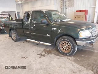2003 Ford F-150 XL with VIN 2FTRX17273CA22817, listed as a IAAI auction lot 41579246 with 0 mi miles. Bid and sale history available at carsss.com. Image 1.