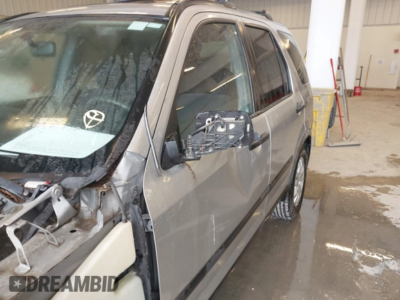 2006 Honda CR-V EX with VIN JHLRD78856C033763, listed as a IAAI auction lot 41715433 with 220,490 mi miles and . Bid and sale history available at carsss.com. Image 14.