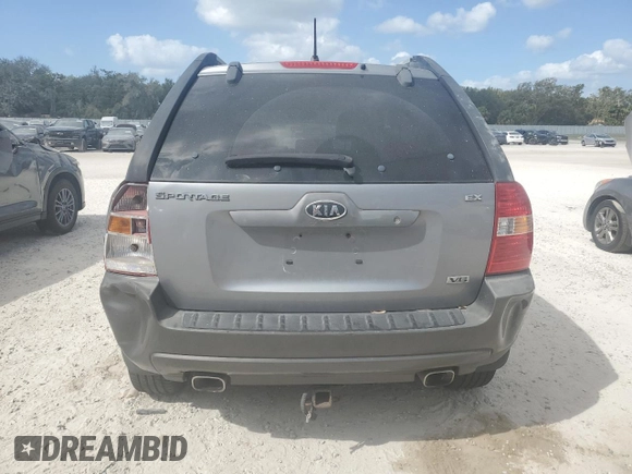 2005 Kia Sportage LX with VIN KNDJE723757076660, listed as a Copart auction lot 86119444 with 106,000 mi miles and Clean Title. Bid and sale history available at carsss.com. Image 6.