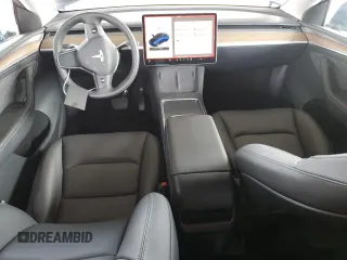 2024 Tesla Model Y Long Range with VIN 7SAYGDEE6RF025366, listed as a Copart auction lot 49328055 with 10,319 mi miles and Salvage Title. Bid and sale history available at DreamBid. Image 8.