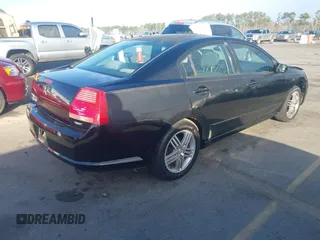 2004 Mitsubishi Galant ES with VIN 4A3AB36F74E077627, listed as a IAAI auction lot 41734910 with 196,299 mi miles. Bid and sale history available at carsss.com. Image 4.