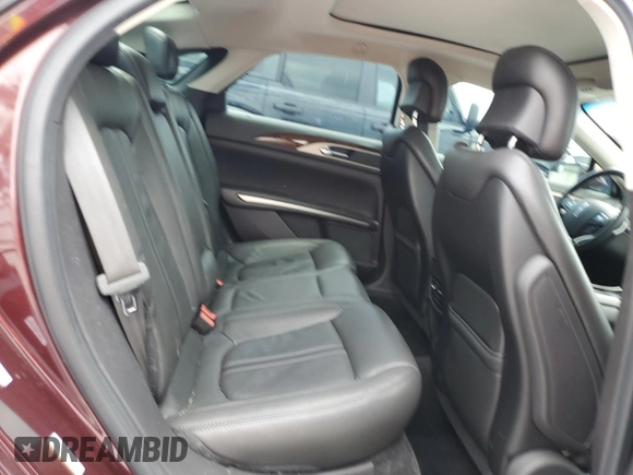 2013 Lincoln MKZ z VIN 3LN6L2G91DR822051, wystawiony jako Copart lot #64748755 z przebiegiem 187 444 mil mil oraz Szkoda całkowita • Salvage title. Historia ofert i sprzedaży dostępna na DreamBid. Obrazek 10.