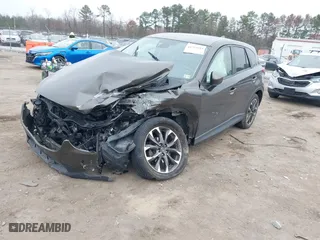 2016 Mazda CX-5 Grand Touring with VIN JM3KE2DY7G0645008, listed as a IAAI auction lot 41793044 with 1 mi miles. Bid and sale history available at carsss.com. Image 17.