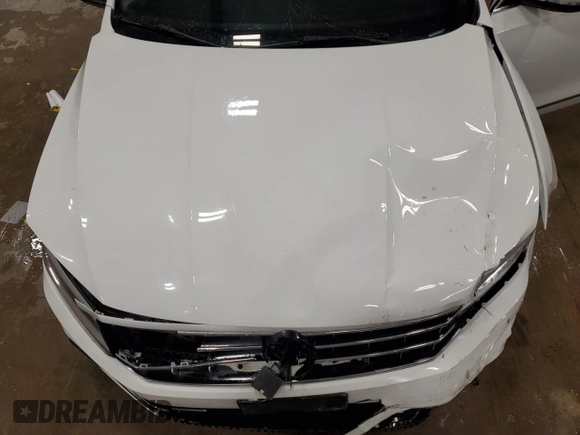 2018 Volkswagen Passat SEL Premium z VIN 1VWCA7A38JC029626, wystawiony jako Copart lot #52119595 z przebiegiem 63 342 mil mil oraz Nie do naprawy • Non repairable. Historia ofert i sprzedaży dostępna na DreamBid. Obrazek 11.