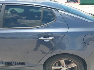 2015 Kia Optima LX with VIN 5XXGM4A71FG472575, listed as a IAAI auction lot 42581639 with 189,348 mi miles and . Bid and sale history available at DreamBid. Image 16.