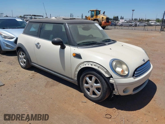 2010 MINI Hardtop with VIN WMWMF3C51ATZ23464, listed as a IAAI auction lot 42710259 with 124,660 mi miles and . Bid and sale history available at DreamBid. Image 1.
