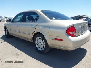 2000 Nissan Maxima GXE z VIN JN1CA31D0YT739248, wystawiony jako IAAI lot #42089086 z przebiegiem 140 979 mil mil oraz . Historia ofert i sprzedaży dostępna na DreamBid. Obrazek 3.