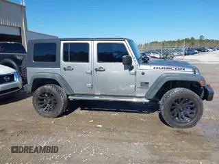 2015 Jeep Wrangler Unlimited Rubicon Hard Rock with VIN 1C4HJWFG2FL587607, listed as a IAAI auction lot 41419237 with 109,719 mi miles and . Bid and sale history available at DreamBid. Image 13.