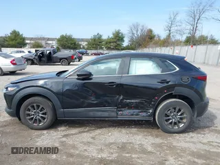 2021 Mazda CX-30 S with VIN 3MVDMBAL5MM214185, listed as a IAAI auction lot 41800888 with 33,267 mi miles and . Bid and sale history available at carsss.com. Image 14.