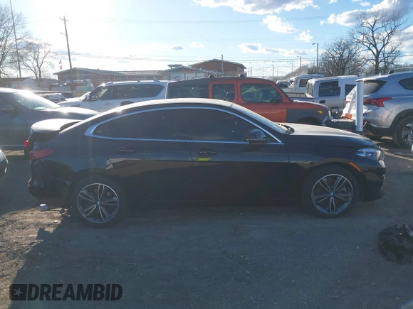 2021 BMW 2 Series 228i xDrive with VIN WBA73AK03M7H66827, listed as a IAAI auction lot 41682959 with 57,875 mi miles and . Bid and sale history available at DreamBid. Image 13.