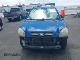 2005 Hyundai Tucson GLS with VIN KM8JN12D45U132721, listed as a IAAI auction lot 42213518 with 153,491 mi miles. Bid and sale history available at carsss.com. Image 6.