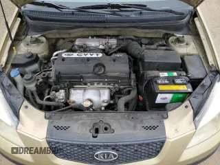 2009 Kia Rio LX with VIN KNADE223496549097, listed as a Copart auction lot 54375975 with 140,882 mi miles and Salvage Title. Bid and sale history available at DreamBid. Image 11.