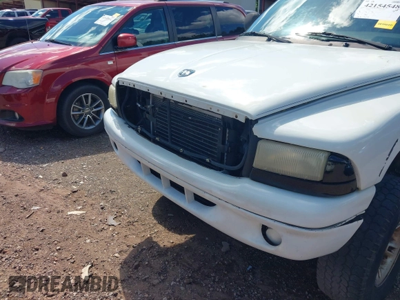 2000 Dodge Dakota Sport z VIN 1B7GG2AN2YS636449, wystawiony jako IAAI lot #42154548 z przebiegiem 186 126 mil mil oraz . Historia ofert i sprzedaży dostępna na DreamBid. Obrazek 6.