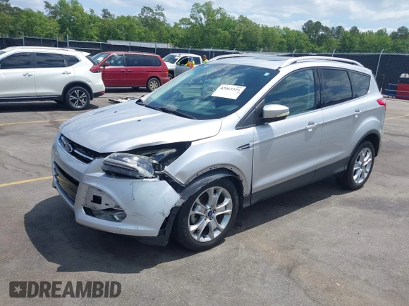 2014 Ford Escape Titanium with VIN 1FMCU0JX7EUA28824, listed as a IAAI auction lot 42065325 with 107,761 mi miles. Bid and sale history available at carsss.com. Image 17.