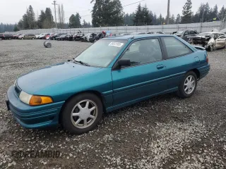 1995 Ford Escort z VIN 1FASP1284SW307142, wystawiony jako Copart lot #88531955 z przebiegiem 93 323 mil mil oraz Szkoda całkowita • Salvage title. Historia ofert i sprzedaży dostępna na DreamBid. Obrazek 1.