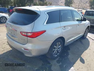 2014 Infiniti QX60 with VIN 5N1AL0MN2EC535673, listed as a IAAI auction lot 42768750 with 163,067 mi miles and . Bid and sale history available at DreamBid. Image 4.