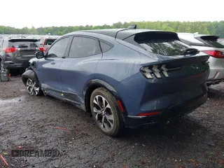 2021 Ford Mustang Mach-E Premium z VIN 3FMTK3RM1MMA06290, wystawiony jako IAAI lot #42200662 z przebiegiem 78 084 mil mil oraz . Historia ofert i sprzedaży dostępna na DreamBid. Obrazek 3.