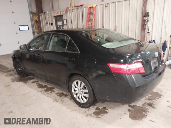 2009 Toyota Camry with VIN 4T1BE46K39U338519, listed as a IAAI auction lot 41940726 with 186,356 mi miles. Bid and sale history available at carsss.com. Image 3.