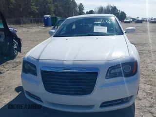 2013 Chrysler 300 with VIN 2C3CCABGXDH699096, listed as a IAAI auction lot 41614034 with 136,344 mi miles. Bid and sale history available at carsss.com. Image 13.